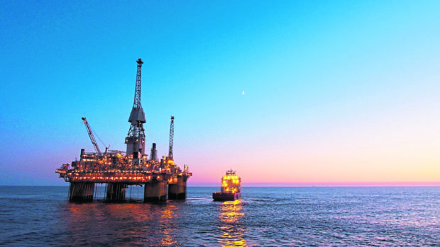Silhouette of a floating production platform in North Sea region.