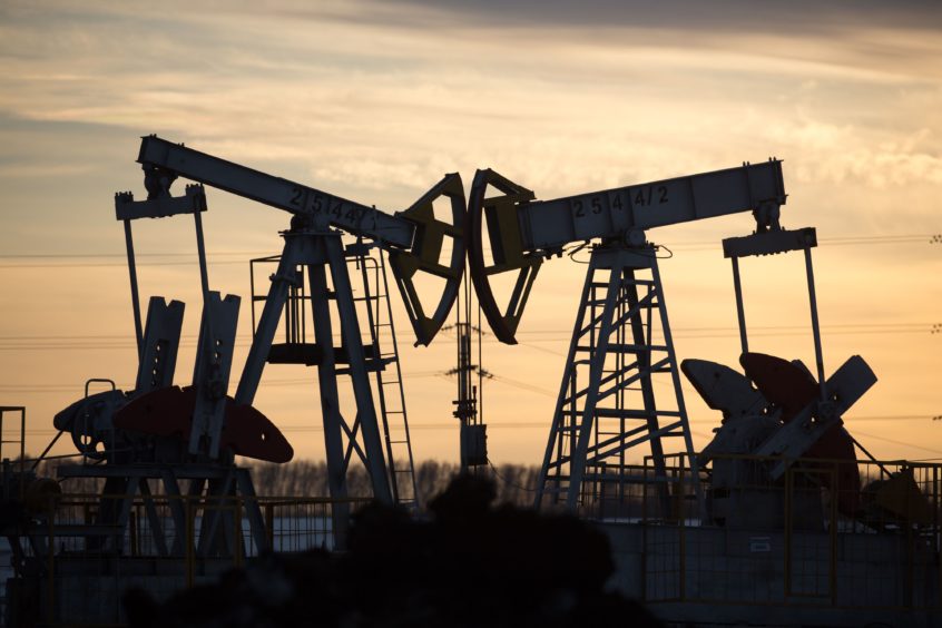 Oil pumping jacks, also known as "nodding donkeys", operate in an oilfield near Almetyevsk, Tatarstan, Russia, on Wednesday, March 11, 2020. Photographer: Andrey Rudakov/Bloomberg