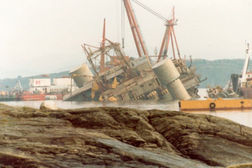 The Alexander Kielland platform in the Gandsfjord during an operation to upright the capsized rig. The vessel was later scuttled.