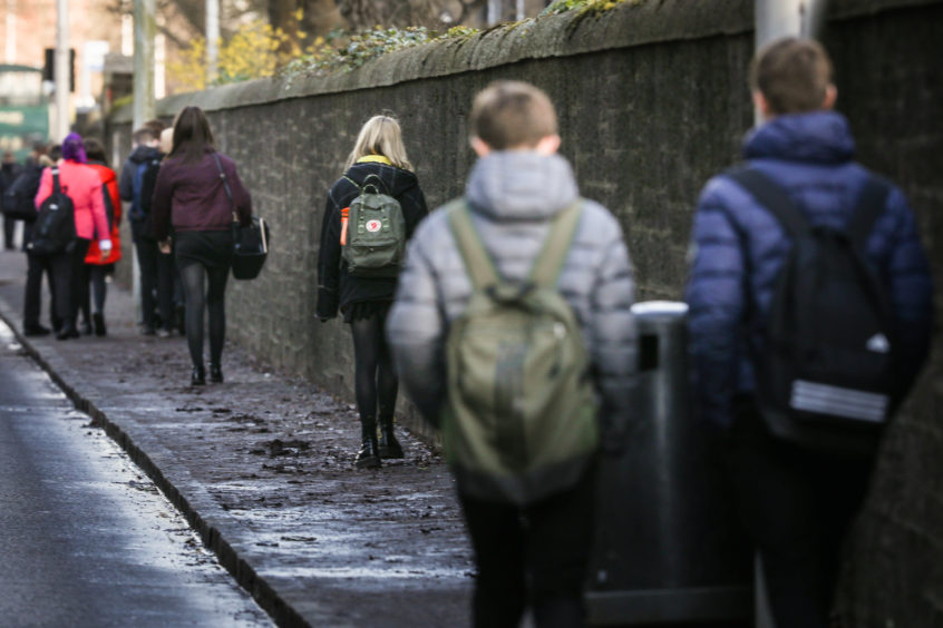 Picture shows; pupils leaving at the end of the school day. Wednesday 18th March, 2020. Mhairi Edwards/DCT Media
