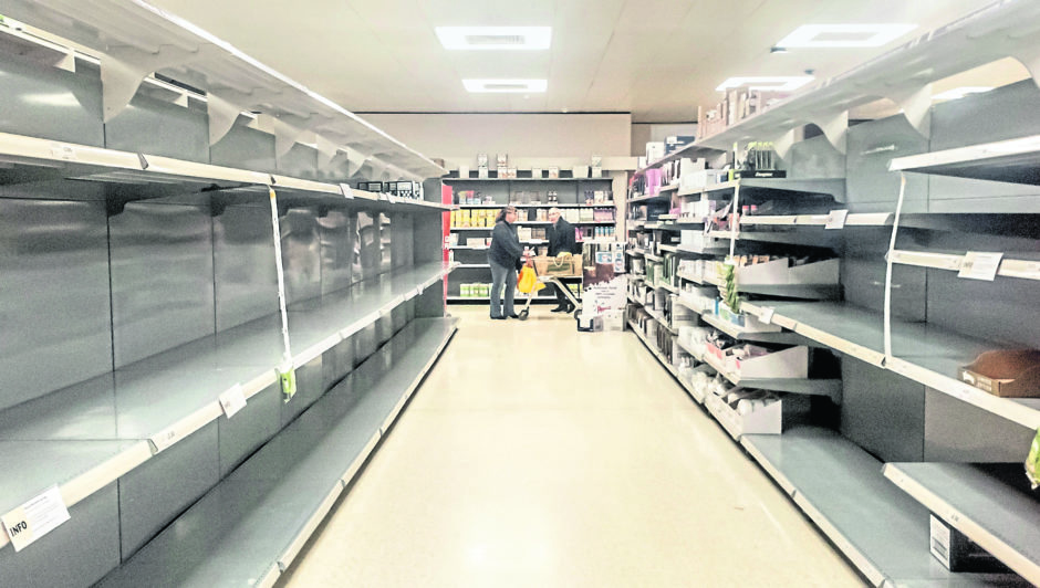panic buying: Supermarket shelves have been picked clean of many goods across the UK since the coronavirus crisis hit