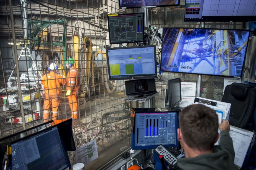 Workers monitor data on computer screens aboard the Maersk Invincible rig, operated by Maersk Drilling Services A/S, on the Valhall field in the North Sea off the coast of Stavanger, Norway, on Wednesday, Oct. 9, 2019. The boss of Maersk Drilling is in no rush to make acquisitions because he believes a rout in equity prices for offshore drillers has further to go. Photographer: Carina Johansen/Bloomberg