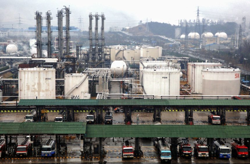 SK Corp. refinery and storage tanks are pictured in Ulsan, South Korea. Photographer: Seokyong Lee/Bloomberg