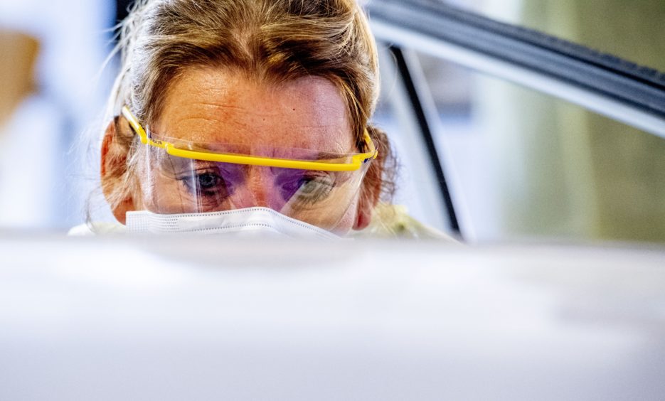 Coronavirus Covid-19 drive through testing, Dordrecht, The Netherlands - 21 Apr 2020 Photo by Robin Utrecht/Shutterstock.