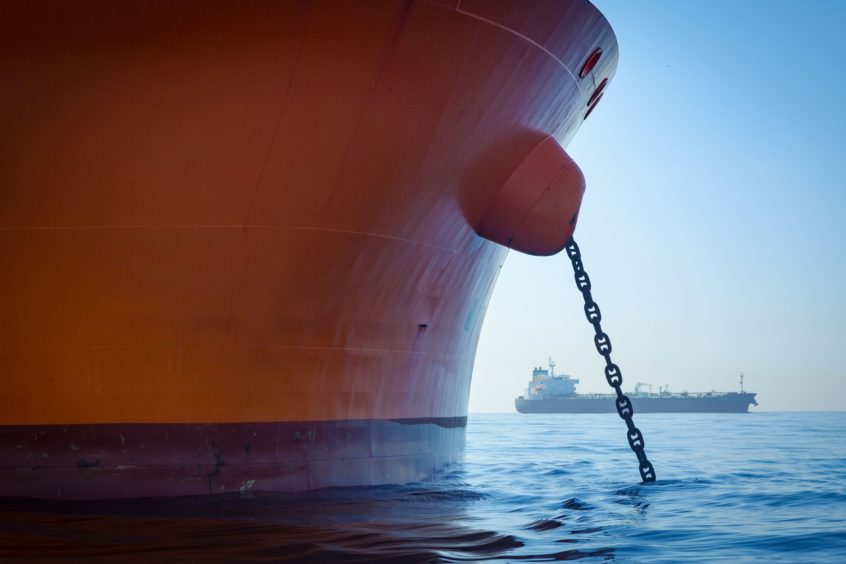 Oil tankers sit anchored off the coast of Long Beach, California, U.S., on Wednesday, April 22, 2020. Almost three dozen ships -- scattered in waters from Long Beach to the San Francisco Bay -- are mostly acting as floating storage for oil that's going unused as the coronavirus pandemic shutters businesses and takes drivers off the road.