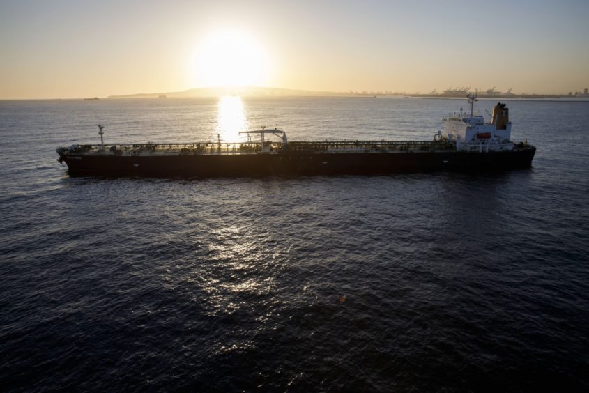 An oil tanker is seen anchored in the Pacific Ocean in this aerial photograph taken above Long Beach, California, U.S., on Friday, May 1, 2020.  Photographer: Patrick T. Fallon/Bloomberg