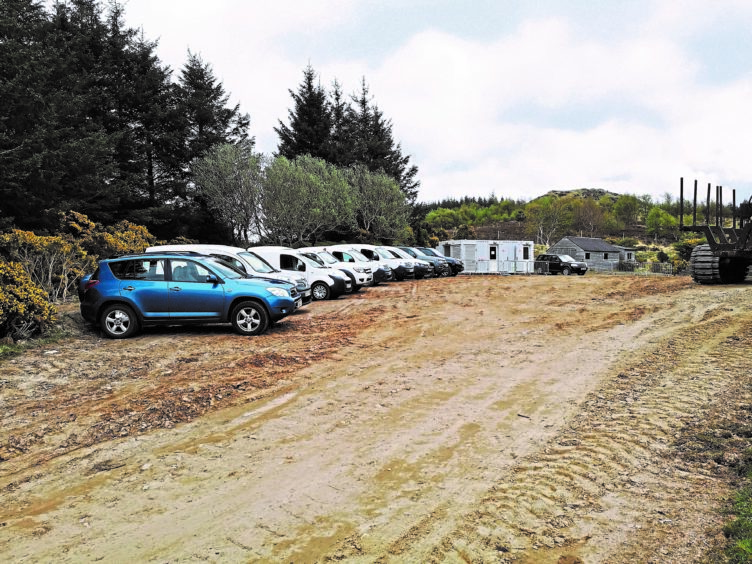 Cars of workers parked outside RTS Ltd’s cabin base at the Limekiln wind farm site near Reay.
Iain Grant.