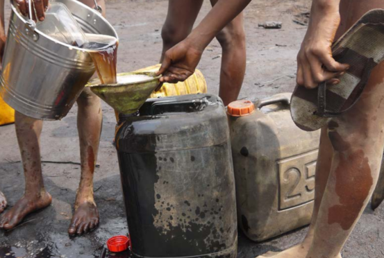 Workers at an artisanal refining camp.
Source: SDN