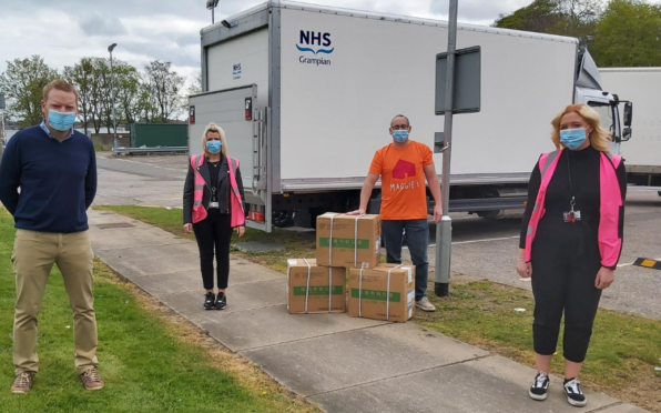 Wood donates 10k masks to ARI.