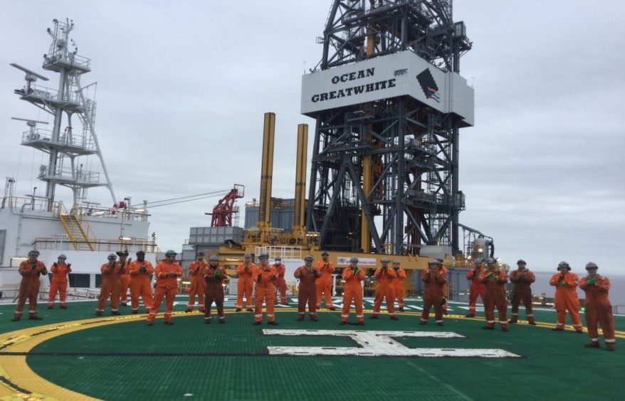 Crew on the Ocean GreatWhite clapping for the NHS.