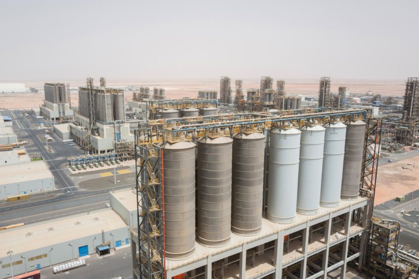 Processing tanks stand at the Ruwais refinery and petrochemical complex, operated by Abu Dhabi National Oil Co. (ADNOC), in Al Ruwais, United Arab Emirates, on Monday, May 14, 2018. Adnoc is seeking to create worlds largest integrated refinery and petrochemical complex at Ruwais. Photographer: Christophe Viseux/Bloomberg