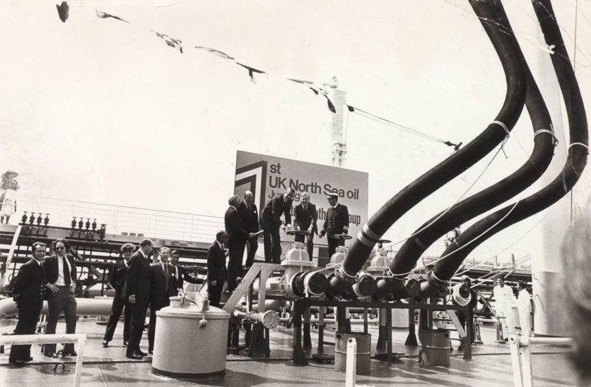 Picture of Britains' first North Sea oil coming ashore from the Argyll field in 1975.
The former energy secretary Tony Benn is second from the right on the platform.