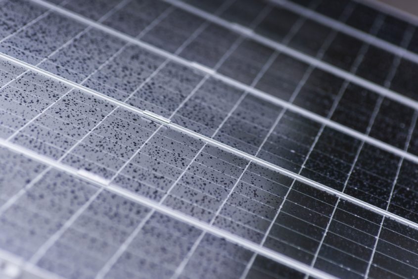 Rain droplets cover solar panels installed on the roof of a residential property in Johannesburg, South Africa, on Friday, Mar. 13, 2020.