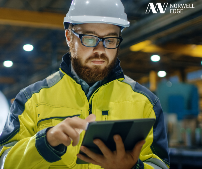 A worker using a tablet device.