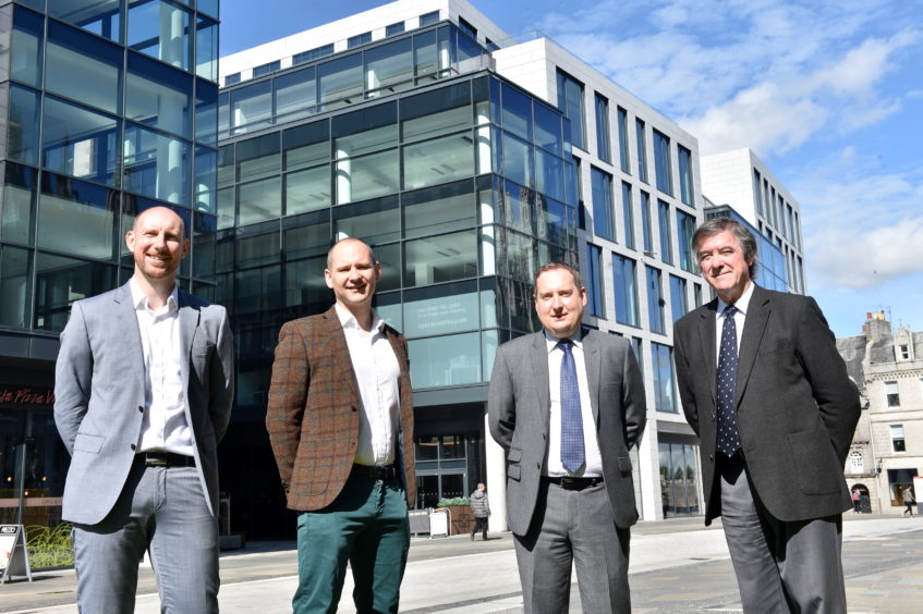 From left, Neil Edward, Brian Archer, David Sinclair, and Michael Dursley, of Tech-Terra.