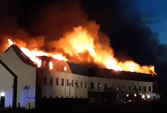 The Moorfield Hotel on fire.