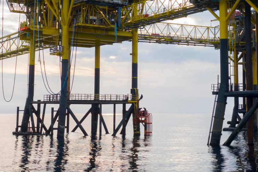 Four activists with Greenpeace are occupying the Dan Bravo oil rig. Photo 
© Andrew McConnell / Greenpeace