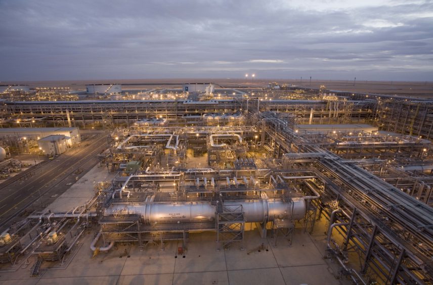 Saudi Aramco has reported its net income has fallen and gearing has risen, driven by tough operatiing conditions and the acquisition of a stake in SABIC.