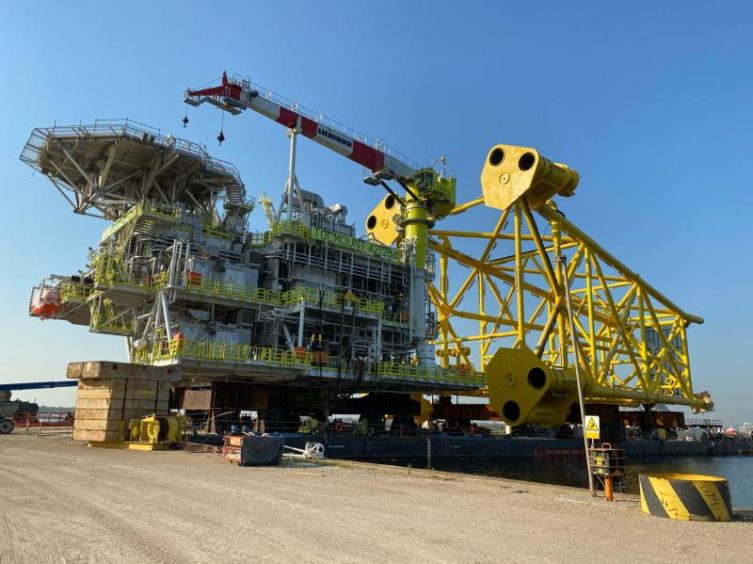 The Tolmount topsides and jackets on a barge in Italy.