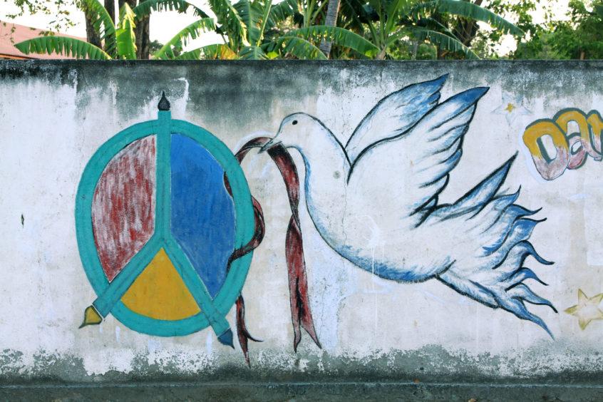 A mural on a wall in Dili, East Timor. Photo by Damon Evans