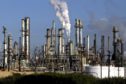 A ConocoPhillips refinery stands in Wilmington, California, U.S. Photographer:Jonathan Alcorn/Bloomberg