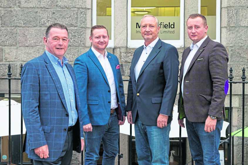 VENTURE: From left: David Rennie, who has been appointed legal counsel for Mansefield Investments, alongside Harry, Mark and Philip Patterson.