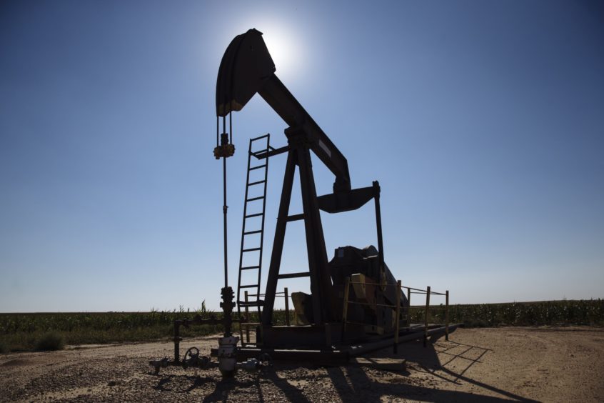 A pump jack operates near Hugoton, Kansas, U.S., on Friday, Sept. 25, 2020.