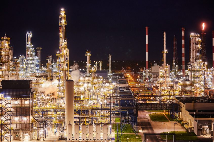 Pipework and refining towers at an oil refinery in Poland. Photographer: Bartek Sadowski/Bloomberg