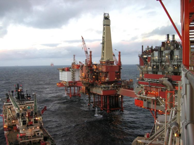 Rig and production facility on North Sea oil field.