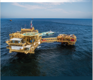 Oil platform offshore, in blue seas