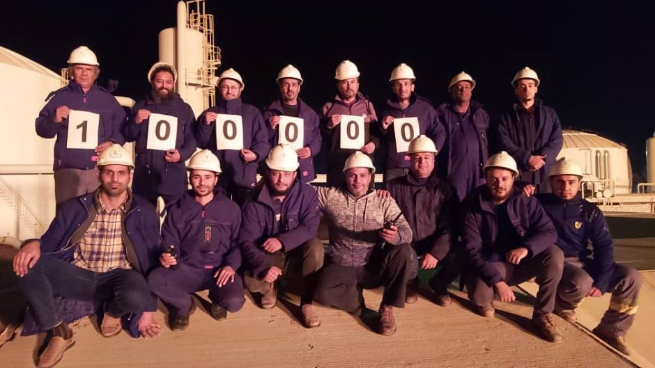 Sirte Oil Co. employees celebrate reaching 100,000 bpd on December 17, 2020