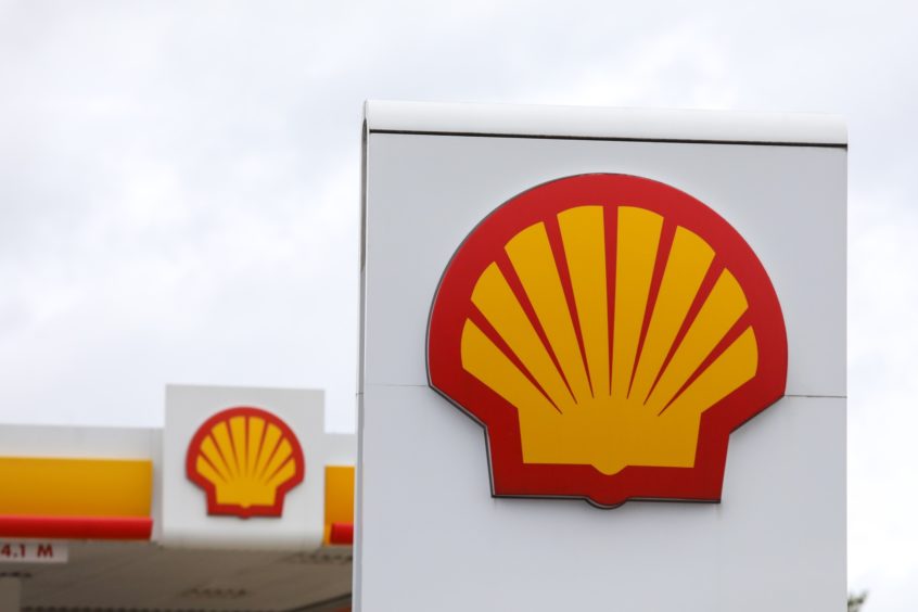 Shell logo against overcast sky