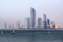The Landmark skyscraper, center, stands on the city skyline beside a waterway in Abu Dhabi, United Arab Emirates, on Monday, May 30, 2016.  Photographer: Alex Atack/Bloomberg