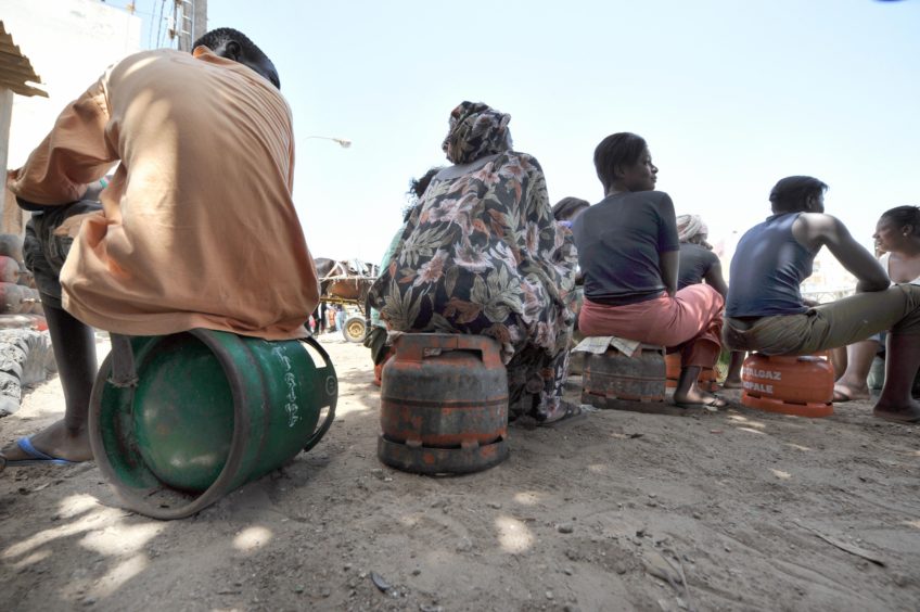 People sitting in a queue