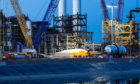 Fluor plans to sell off its Stork unit with the next 12-18 months, amid a shift to more reimbursable work.