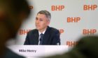 Mike Henry, incoming chief executive officer of BHP Group Ltd., listens during a news conference at the company's headquarters in Melbourne, Australia, on Thursday, Nov. 14, 2019. BHP named Henry, the head of its Australian operations, as chief executive officer to steer the world's top miner through looming challenges from slower growth in China and investor pressure over climate change. Photographer: Carla Gottgens/Bloomberg