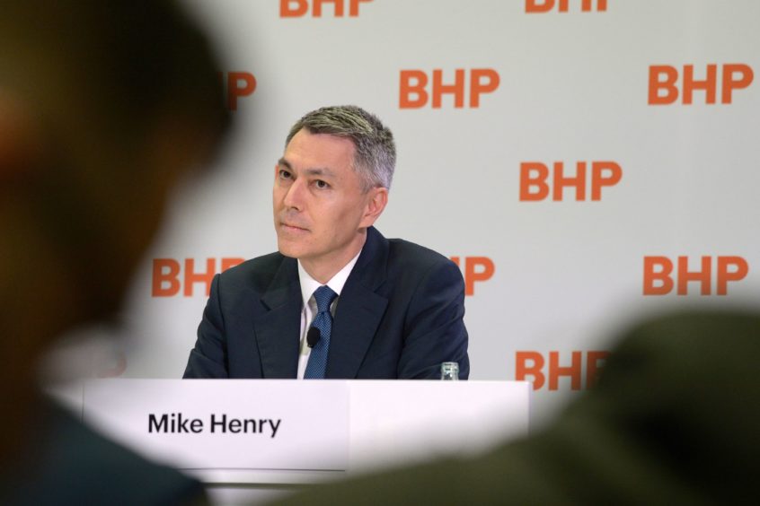 Mike Henry, incoming chief executive officer of BHP Group Ltd., listens during a news conference at the company's headquarters in Melbourne, Australia, on Thursday, Nov. 14, 2019. BHP named Henry, the head of its Australian operations, as chief executive officer to steer the world's top miner through looming challenges from slower growth in China and investor pressure over climate change. Photographer: Carla Gottgens/Bloomberg