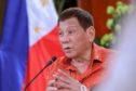 Philippine President Rodrigo Duterte: Photo by Robinson Ninal Jr/AP/Shutterstock