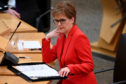 First Minister Nicola Sturgeon attending First Minster's Questions at the Scottish Parliament in Edinburgh today. Jeff J Mitchell/PA Wire
