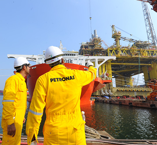 On the job: Petronas workers