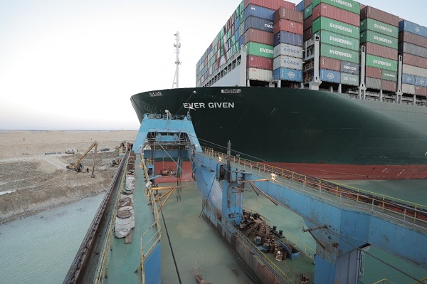 The Ever Given containership is now floating, the Suez Canal Authority has said, although challenges remain.
