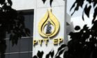 The PTT Exploration & Production Pcl logo is seen at PTTEP's headquarters in Bangkok, Thailand, on Monday, Nov. 12, 2007. Photographer: Udo Weitz/Bloomberg News