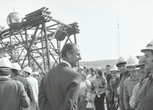 HRH The Prince Philip, Duke of Edinburgh, talking to workers during a visit to Highlands Fabricators' yard at Nigg Bay.