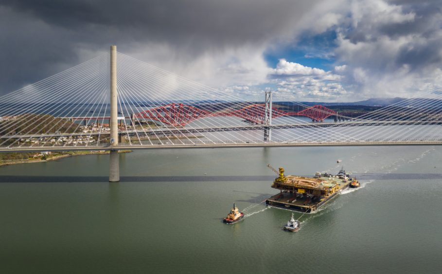 Iron Lady barge with tugs in the Firth of Forth