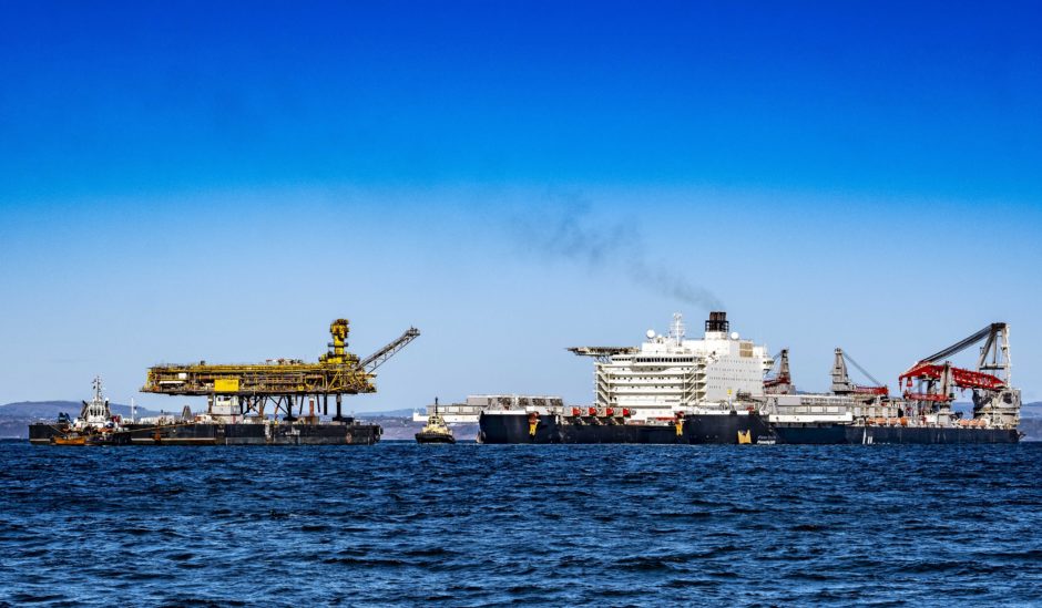 Pioneering Spirit and Iron Lady on the Forth. Pic Peter Devlin