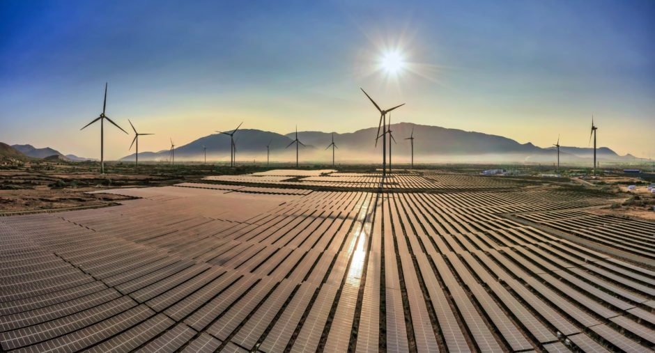 Aerial view of windmill and Solar panel, photovoltaic, alternative electricity source - concept of sustainable resources on a sunny day, Bac Phong, Thuan Bac, Ninh Thuan, VietnamBy: Nguyen Quang Ngoc Tonkin