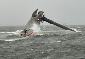 A Coast Guard Station Grand Isle 45-foot Response Boat-Medium boatcrew heads toward a capsized 175-foot commercial lift boat April 13, 2021 searching for people in the water 8 miles south of Louisiana. (U.S. Coast Guard photo courtesy of Coast Guard Cutter Glenn Harris)