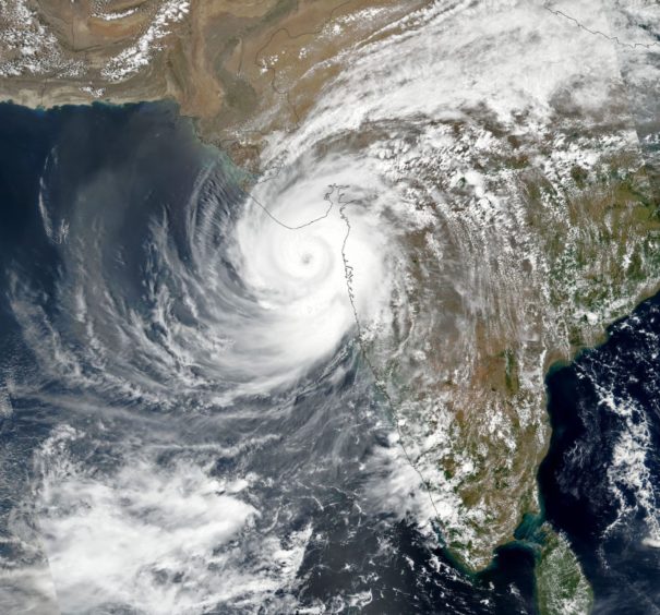 As Tauktae approached land last week, the U.S. Joint Typhoon Warning Center reported maximum sustained winds of 100 knots (125 miles per hour) and gusts up to 125 knots (145 miles per hour), equivalent to a category 3 or 4 hurricane.
Mandatory Credit: Photo by NASA Earth/ZUMA Wire/Shutterstock (11908314a)