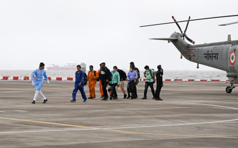 Rescued employees by Indian Navy seen at INS Shikra in Colaba.
Employees working at an oil rig were stranded at sea due to cyclone 'Tauktae'.
Mandatory Credit: Photo by Ashish Vaishnav/SOPA Images/Shutterstock