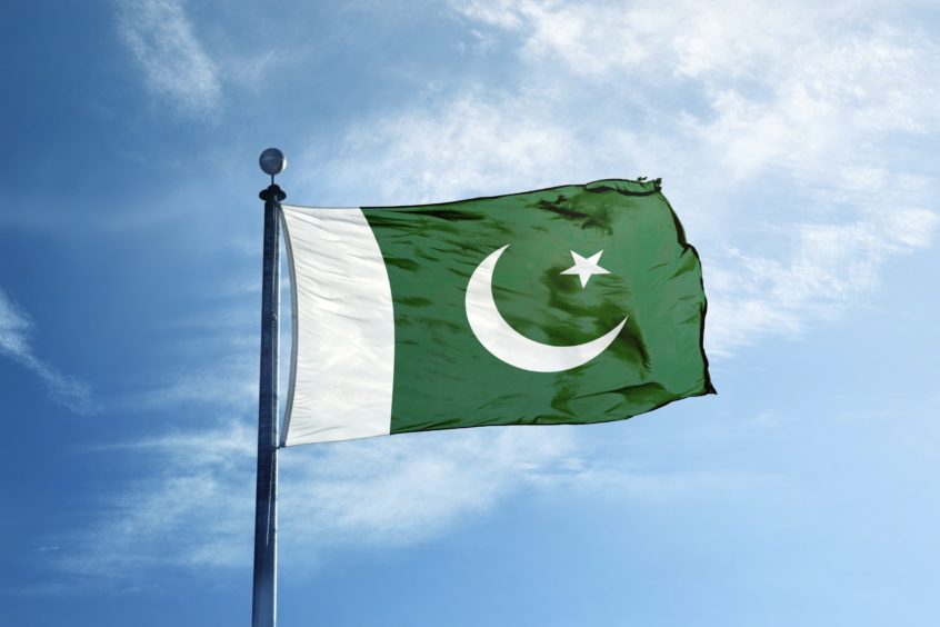 Pakistan flag flutters in the wind.